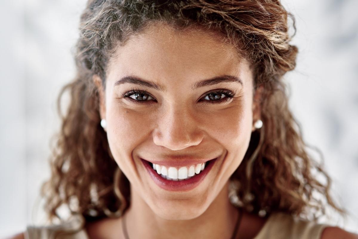 women smiling with teeth showing
